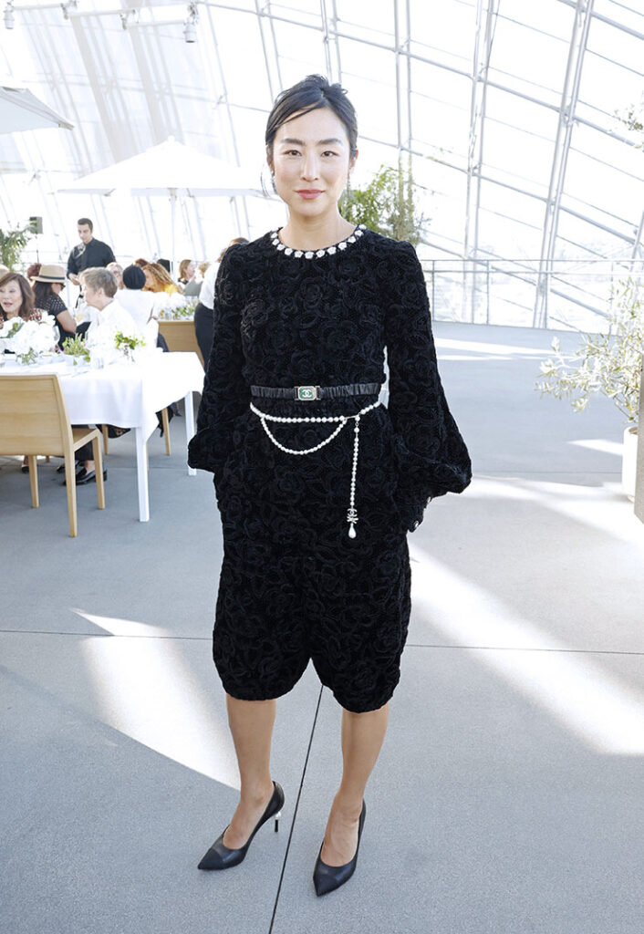 Greta Lee, wearing CHANEL, attends the Academy Women's Luncheon Presented By CHANEL at the Academy Museum of Motion Pictures