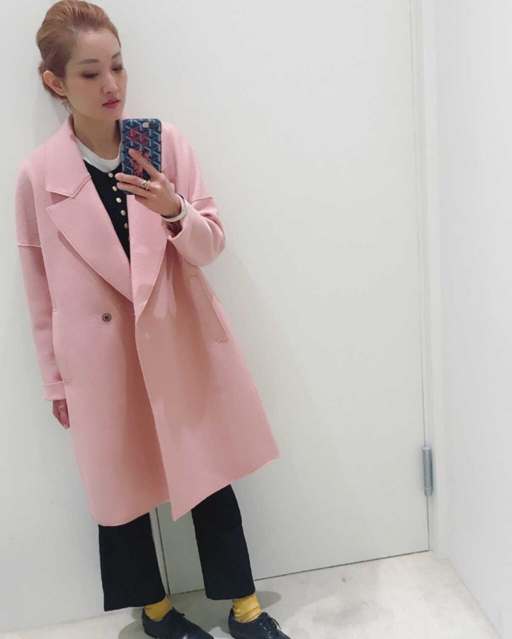 Coat: Knee-Length with an Oversized Collar