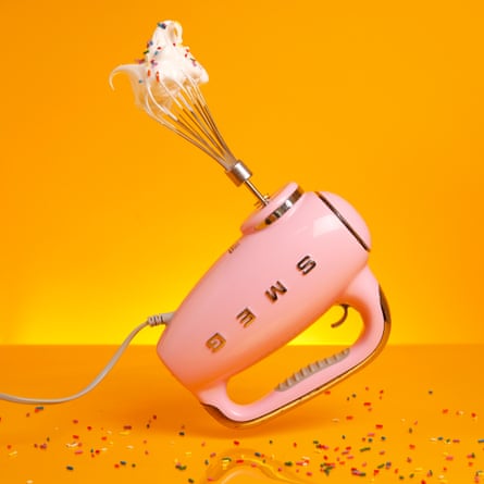 Pink Smeg electric hand mixer.