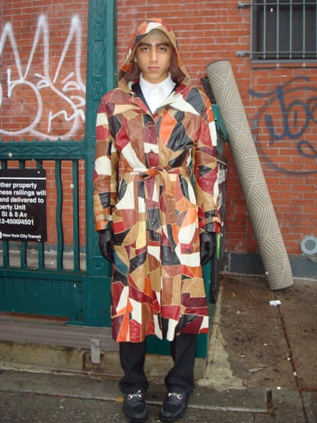 man in colorful raincoat-style coat