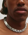 A model wearing a silver Phoebe Philo ‘mum’ necklace