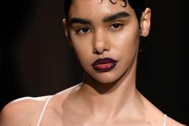 Model at Kim Shui show wearing ombr lips look.