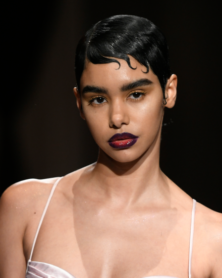 Model at Kim Shui show wearing ombr lips look.
