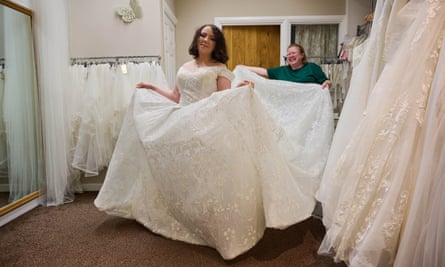 Coral Harden tries on a wedding dress