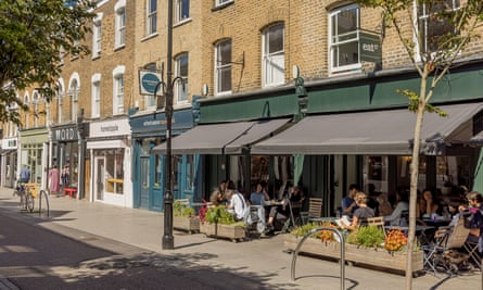 People eating al fresco as a cafe in Walthamstow