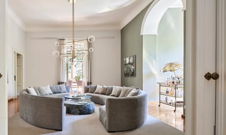 Breathing space: the living room is made for entertaining, with its huge sofas and vintage-inspired drinks trolley.