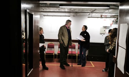 Stephen Fry and Olivia Colman share a joke backstage.