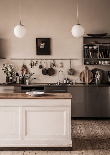 Counter culture: the kitchen, where an old shop counter is repurposed as a kitchen island.