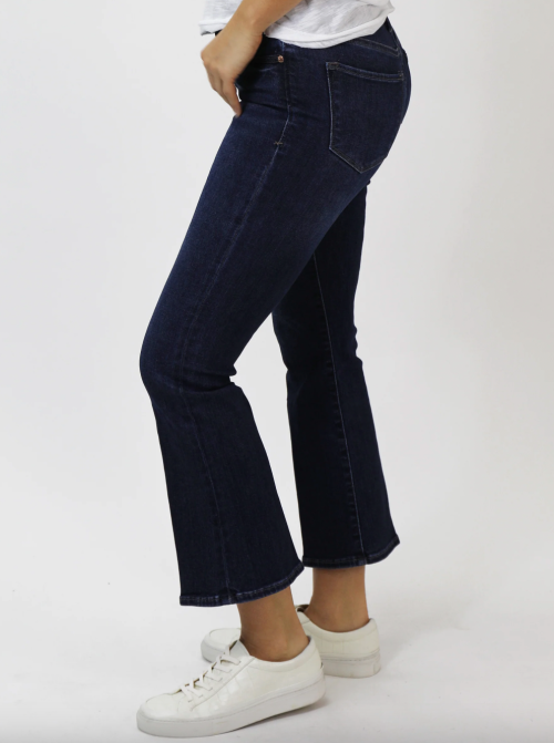Side view of model wearing Dear John Denim jeans