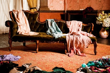 Vintage clothing scattered in a woman’s dressing room