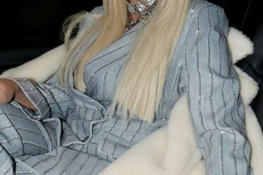 Beyoncé rocks platinum blonde hair and shirtless suit with stunning diamond necklace