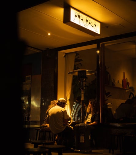 Patrons sitting outside at the ‘haven of calm’ Nearly bar, in Adelaide