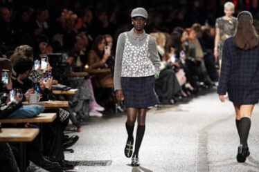 A model walks the runway at Chanel’s Metiers D’Art fashion show
