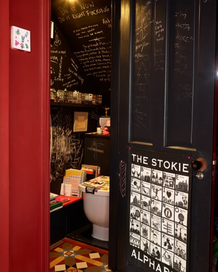 Seat of learning: the loo with blackboard on which guests can share their wisdom.