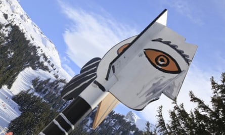Picasso’s Tête de Femme on a pole against snowy slopes