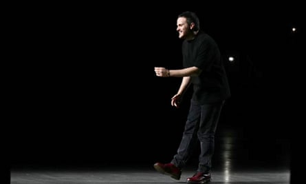 Italian designer Sabato De Sarno smiles as he take a bow at the end of his Gucci menswear show. 
