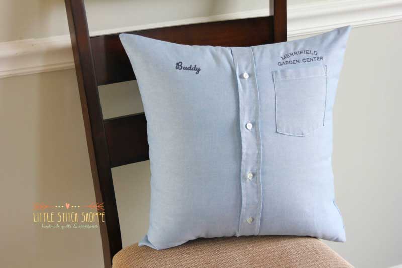 Custom memory pillow made from a blue work shirt with embroidered details.