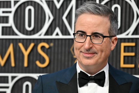 US-ENTERTAINMENT-TV-AWARDS-EMMY-ARRIVALS-RED CARPETBritish television host John Oliver arrives for the 75th Emmy Awards at the Peacock Theatre at L.A. Live in Los Angeles on January 15, 2024. (Photo by Robyn BECK / AFP) (Photo by ROBYN BECK/AFP via Getty Images)