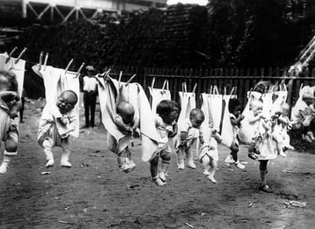 Babies hung out on a washing line