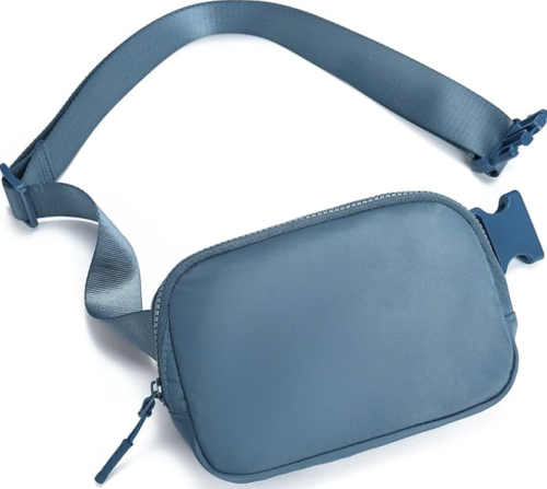 Blue nylon belt bag against a white background