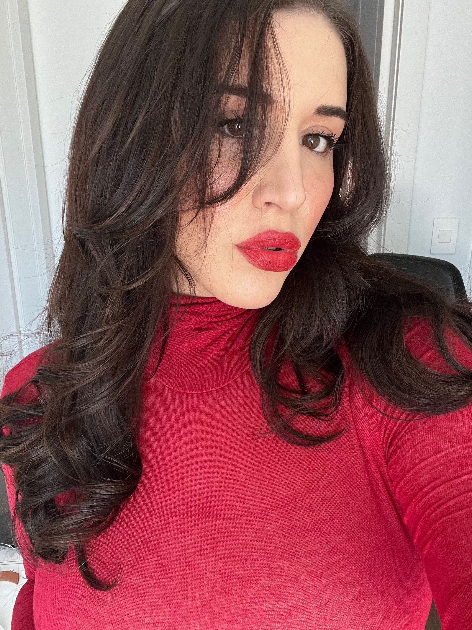 Beauty writer Danielle Sinay wears Hourglass Cosmetics Unlocked Lipstick in Red 0.