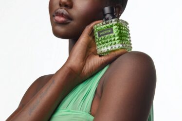 Adut Akech poses in a campaign for Valentino Born in Roma's "Green Stravaganza" flanker.