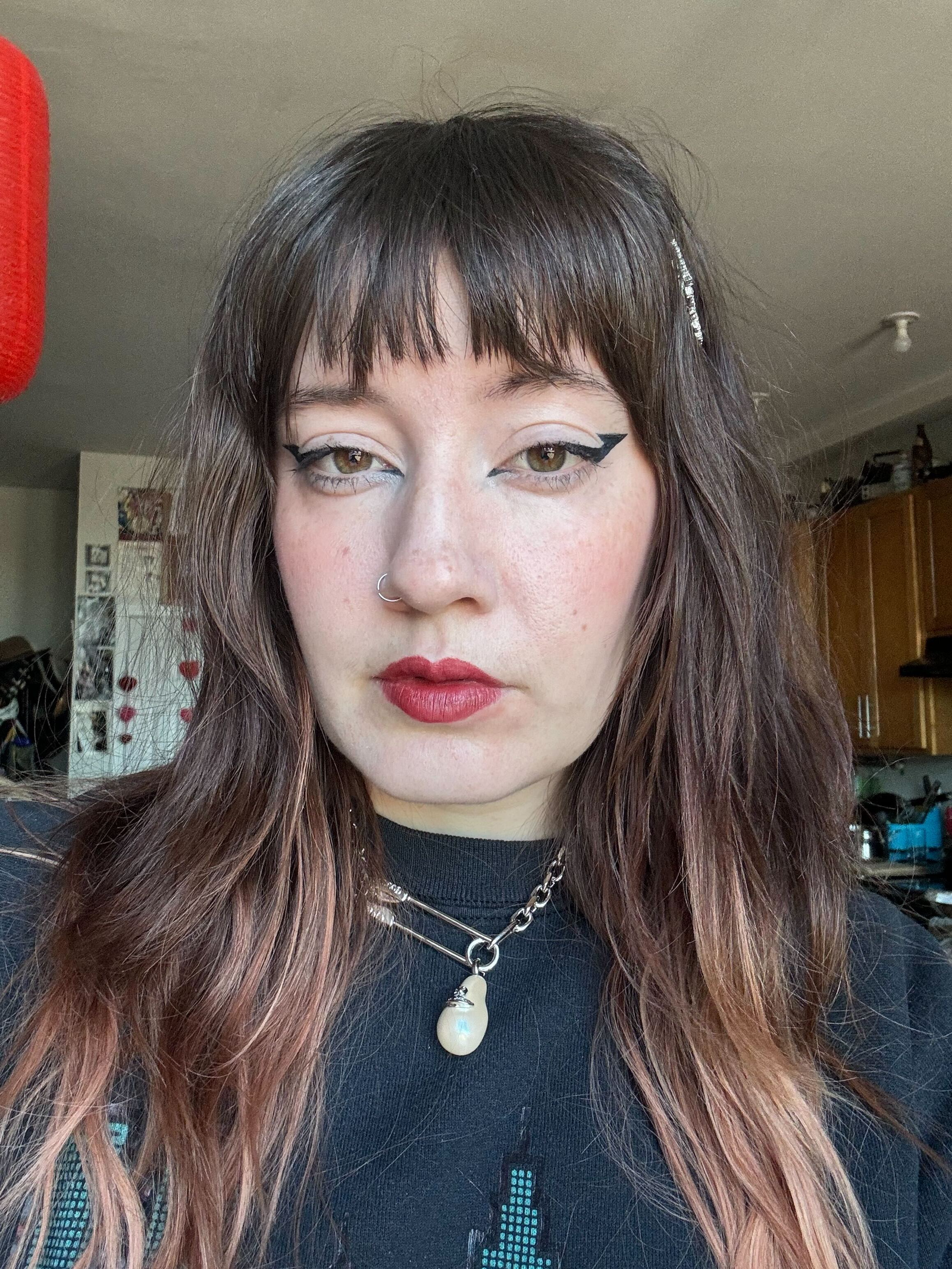 Video development producer Anastasia Sanger wears MAC Lustreglass SheerShine Lipstick in Spice It Up