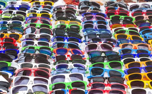 Table of Cheap colorful Sunglasses