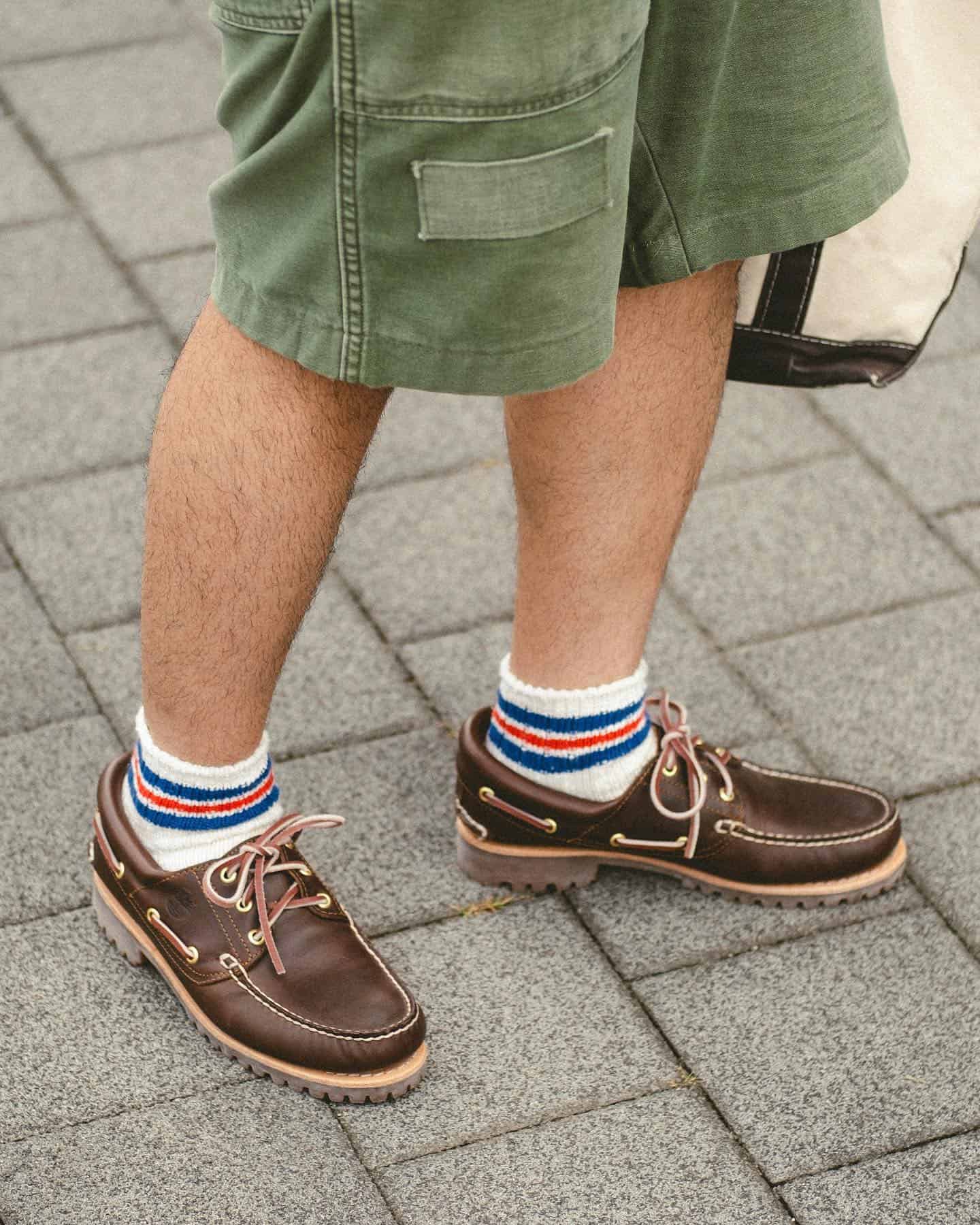wearing a pair of leather boat shoes