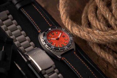 delma divers watch replaced with leather strap
