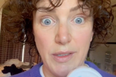 screenshot from Annie Mac's TikTok video where she is holding up Nivea Soft Moisturizing Cream