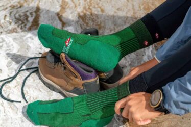 man wearing a pair of green hiking socks