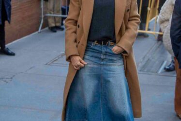 Image may contain Gisele Bündchen Clothing Coat Person Adult Pants Overcoat and Skirt