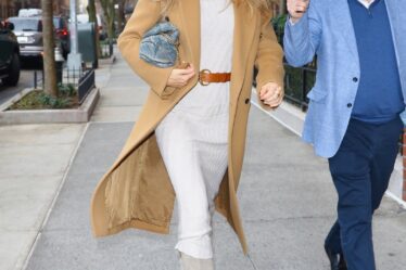 Image may contain Gisele Bündchen Blazer Clothing Coat Jacket Pants Person Walking Adult Footwear Shoe and Car