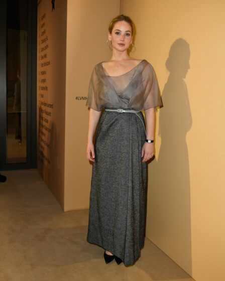 Image may contain Jennifer Lawrence Clothing Dress Evening Dress Formal Wear Adult Person Footwear and High Heel