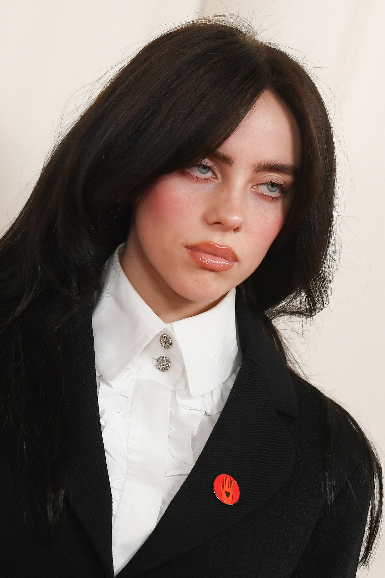 Image may contain Billie Eilish Face Head Person Photography Portrait Blazer Clothing Coat Jacket and Adult