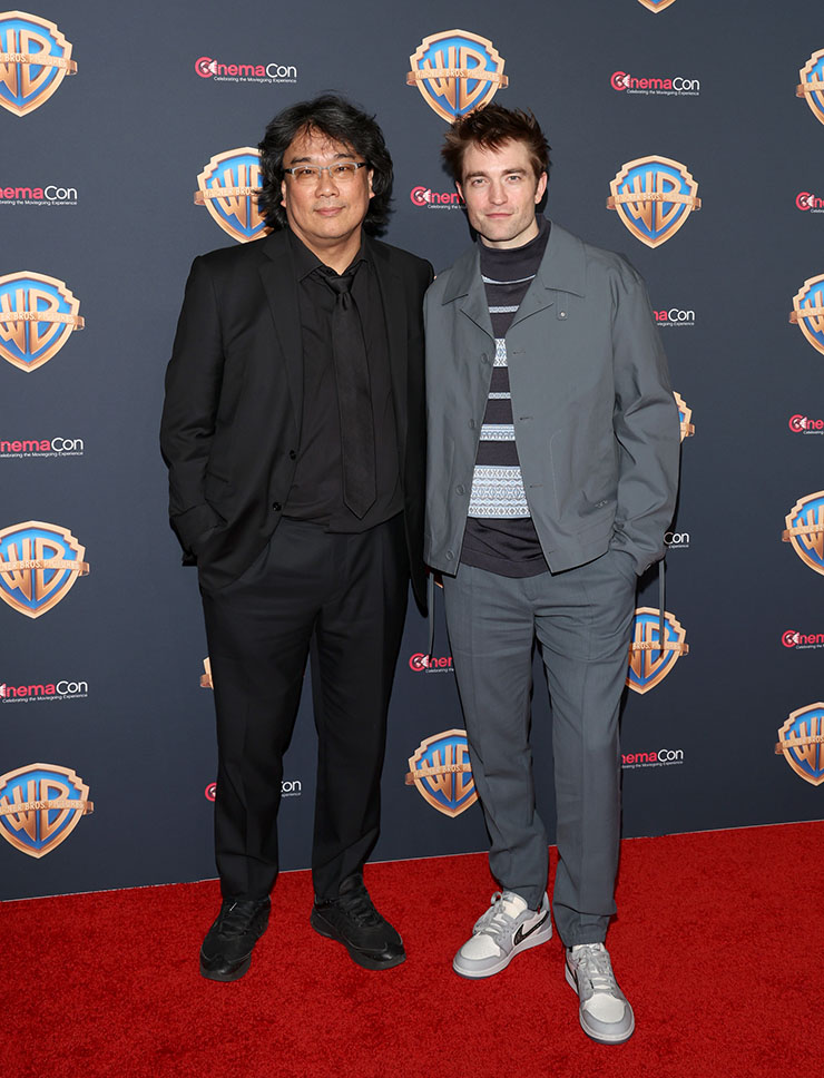 Bong Joon-ho and Robert Pattinson during the Mickey 17 CinemaCon 2024 presentation.