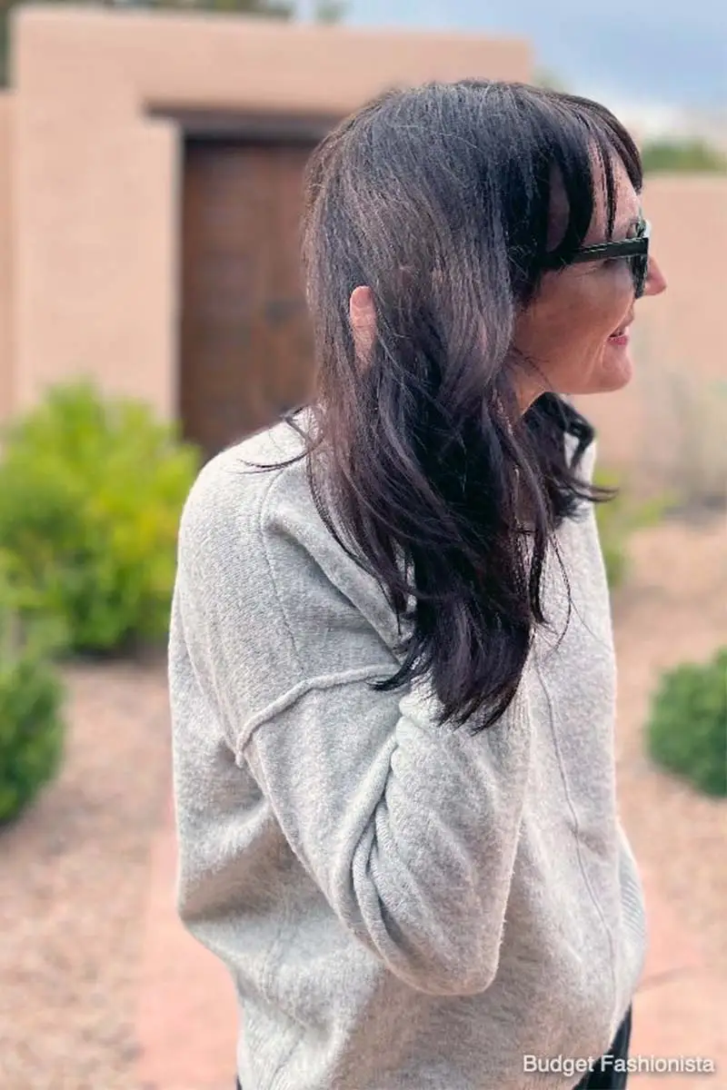 Image of writer Catherine Brock standing outside in Santa Fe, New Mexico.