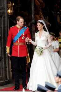 Image may contain Prince William Duke of Cambridge Person Clothing Footwear Shoe Adult Wedding Hat and Lamp