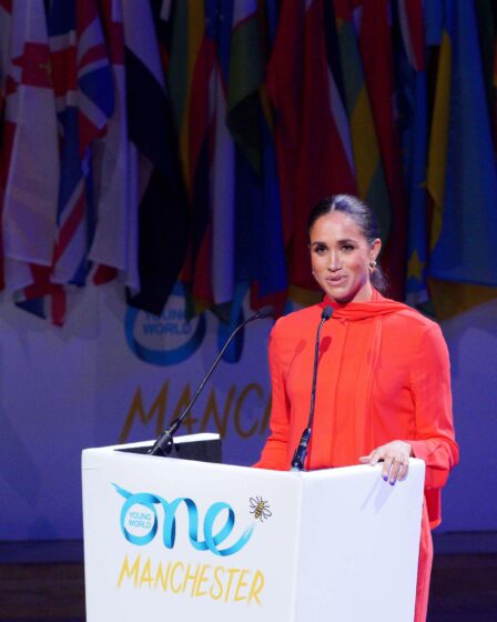 Image may contain Meghan Duchess of Sussex Crowd Person Electrical Device Microphone Audience People and Adult