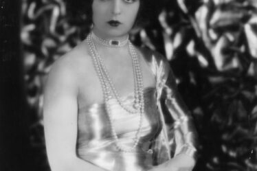 Image may contain Clara Bow Accessories Jewelry Necklace Person Adult Wedding Face Head Photography and Portrait
