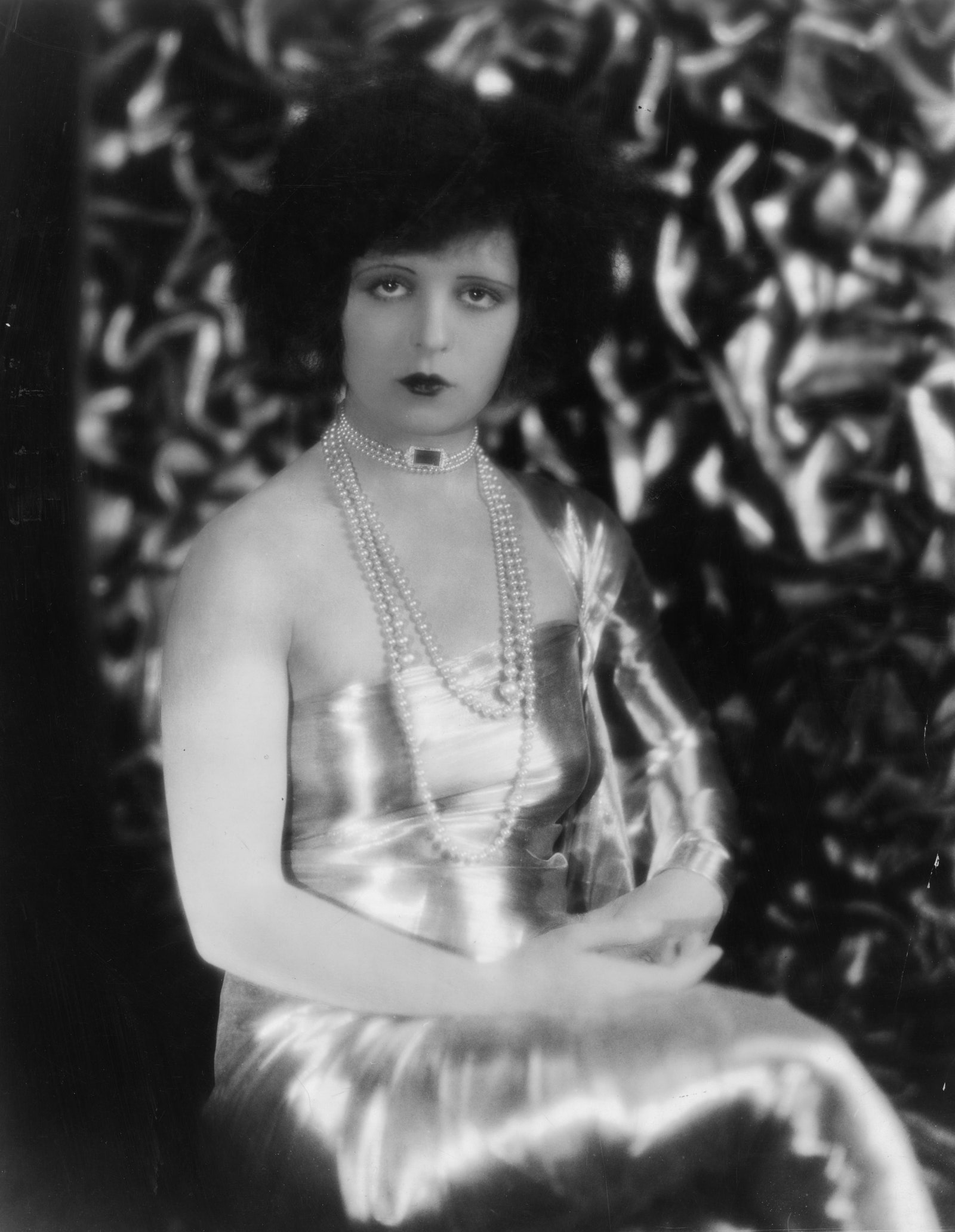 Image may contain Clara Bow Accessories Jewelry Necklace Person Adult Wedding Face Head Photography and Portrait