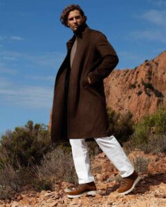 man wearing a brown overcoat
