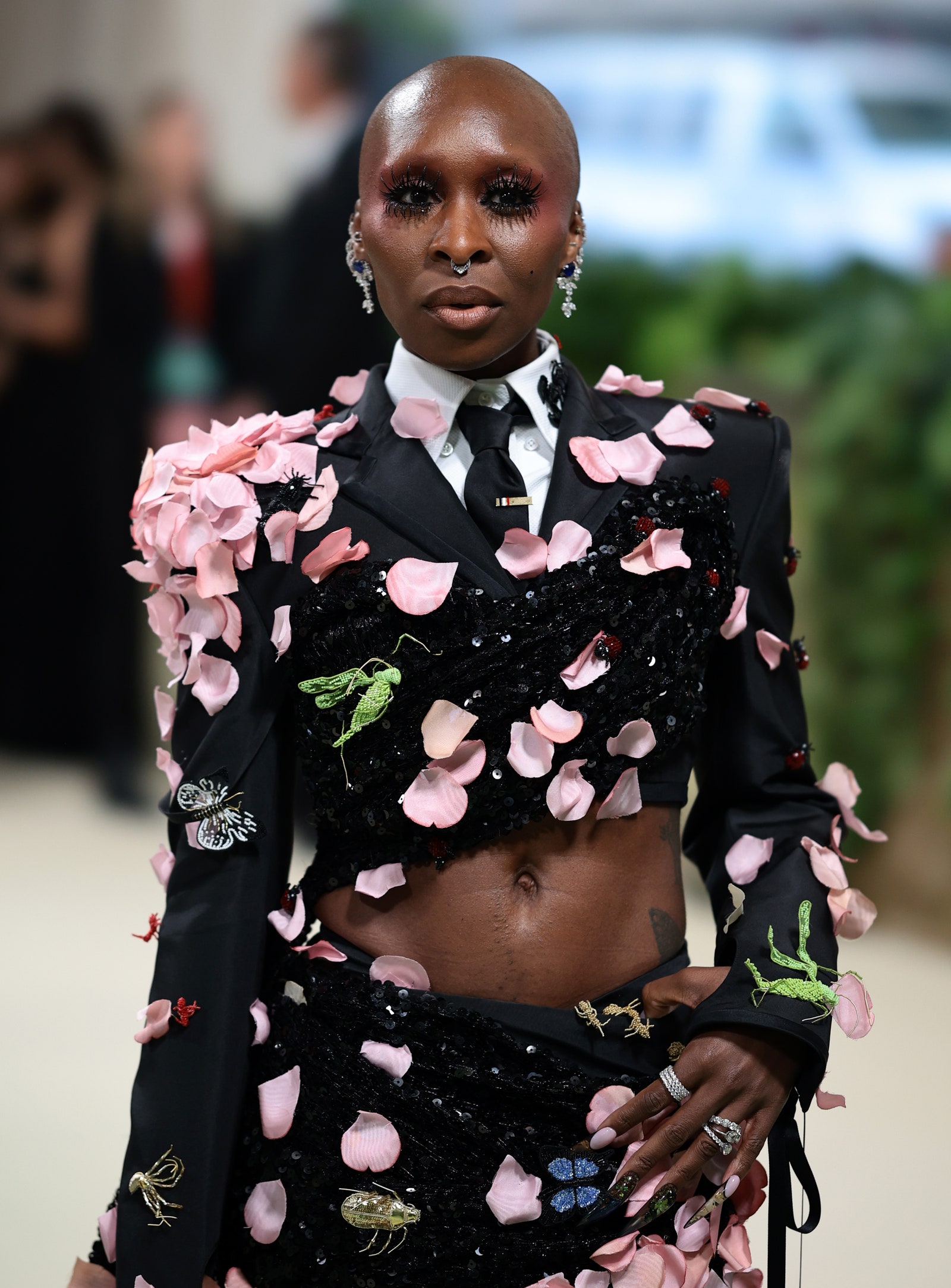 Image may contain Cynthia Erivo Accessories Jewelry Ring Formal Wear Tie and Person