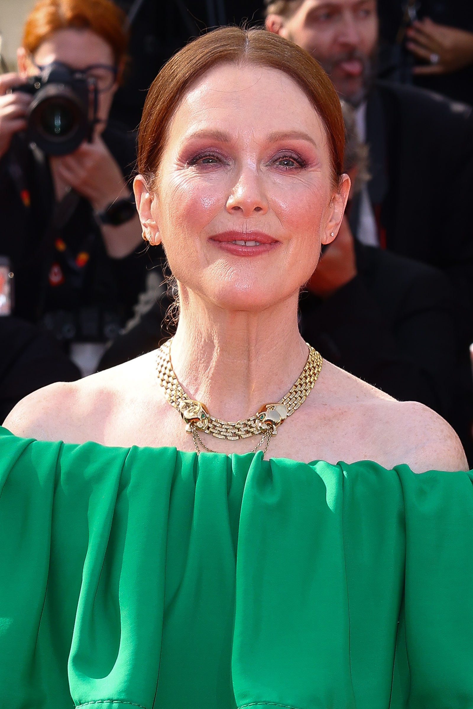 Image may contain Julianne Moore Person Camera Electronics Accessories Jewelry Necklace Adult Wedding and Head