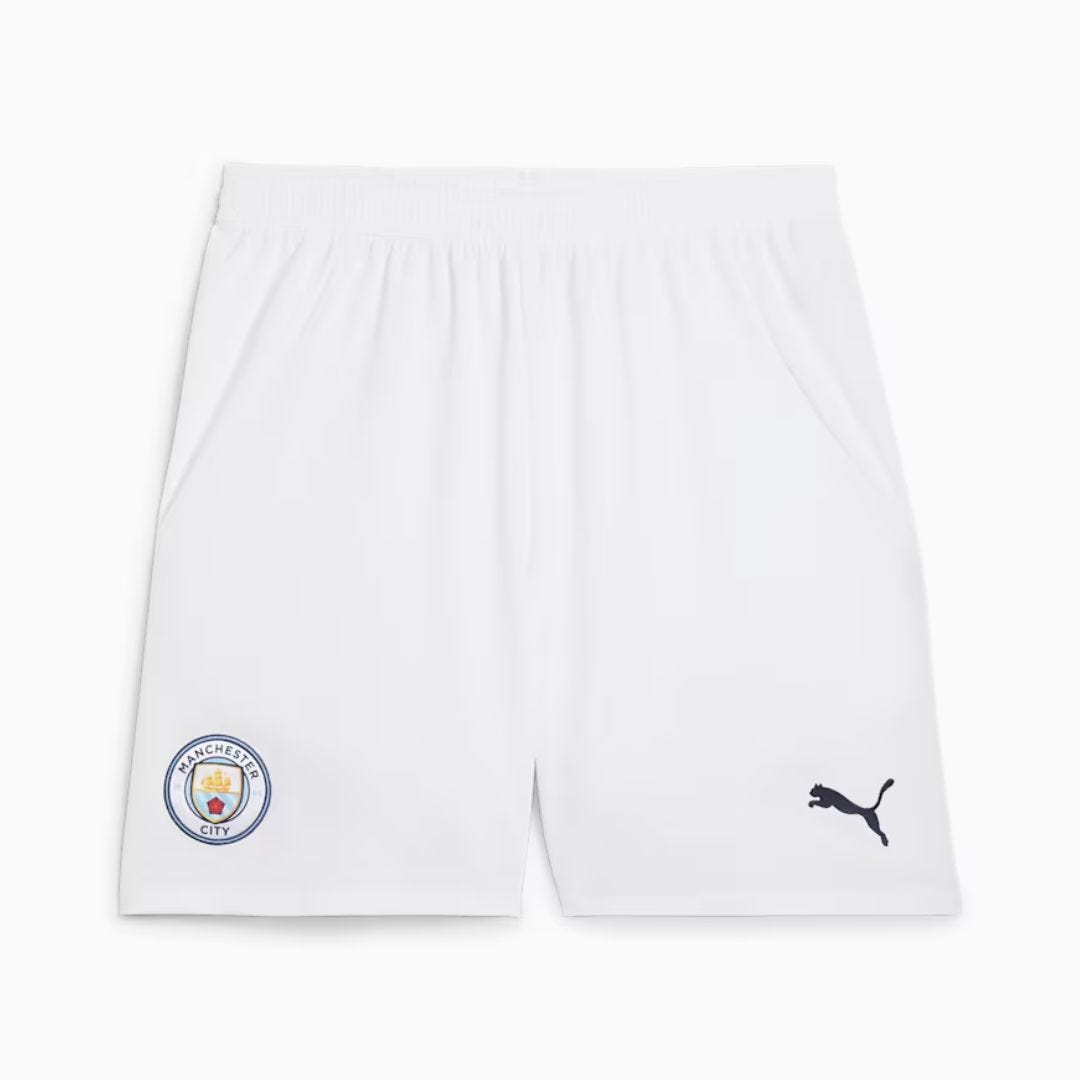 flat lay of puma manchester city footballer shorts