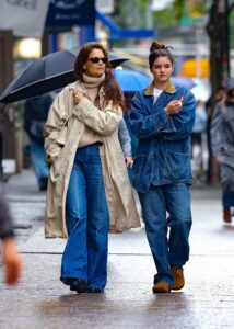 Image may contain Katie Holmes Clothing Pants Jeans Accessories Glasses Adult Person Footwear Shoe and Pedestrian