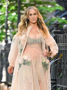 Image may contain Sarah Jessica Parker Blonde Hair Person Adult Clothing Dress Formal Wear Face Happy and Head