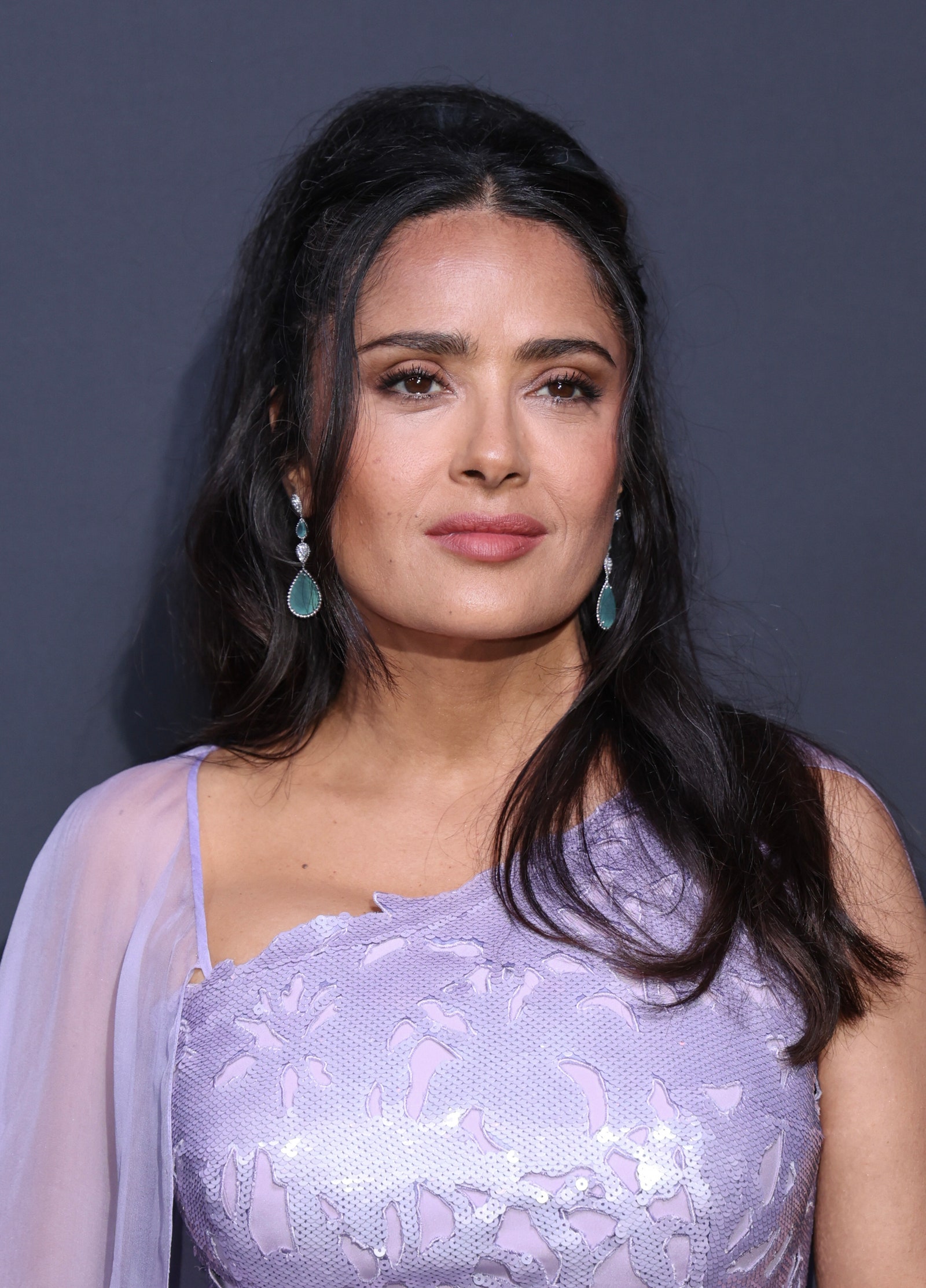 Image may contain Salma Hayek Black Hair Hair Person Clothing Dress Head Face Photography Portrait and Adult