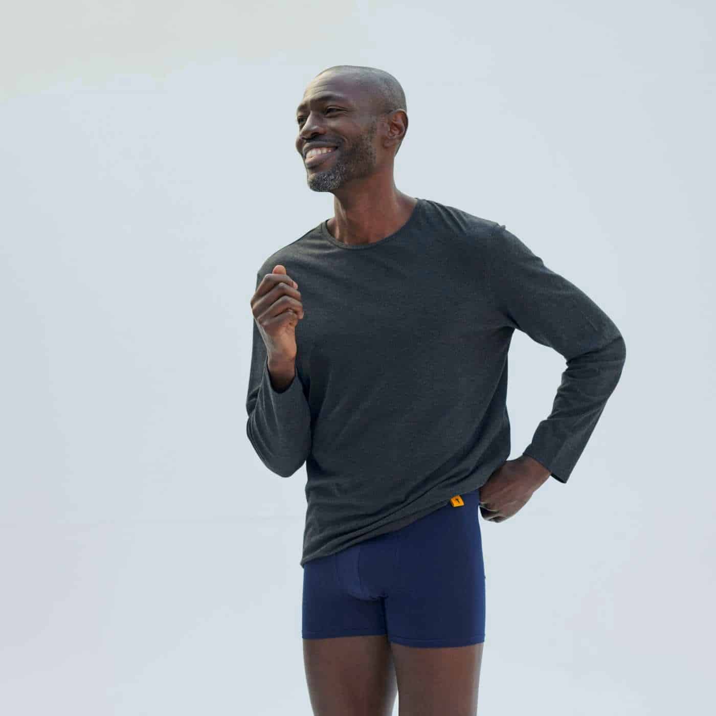 man wearing a navy boxer briefs by London Sock company